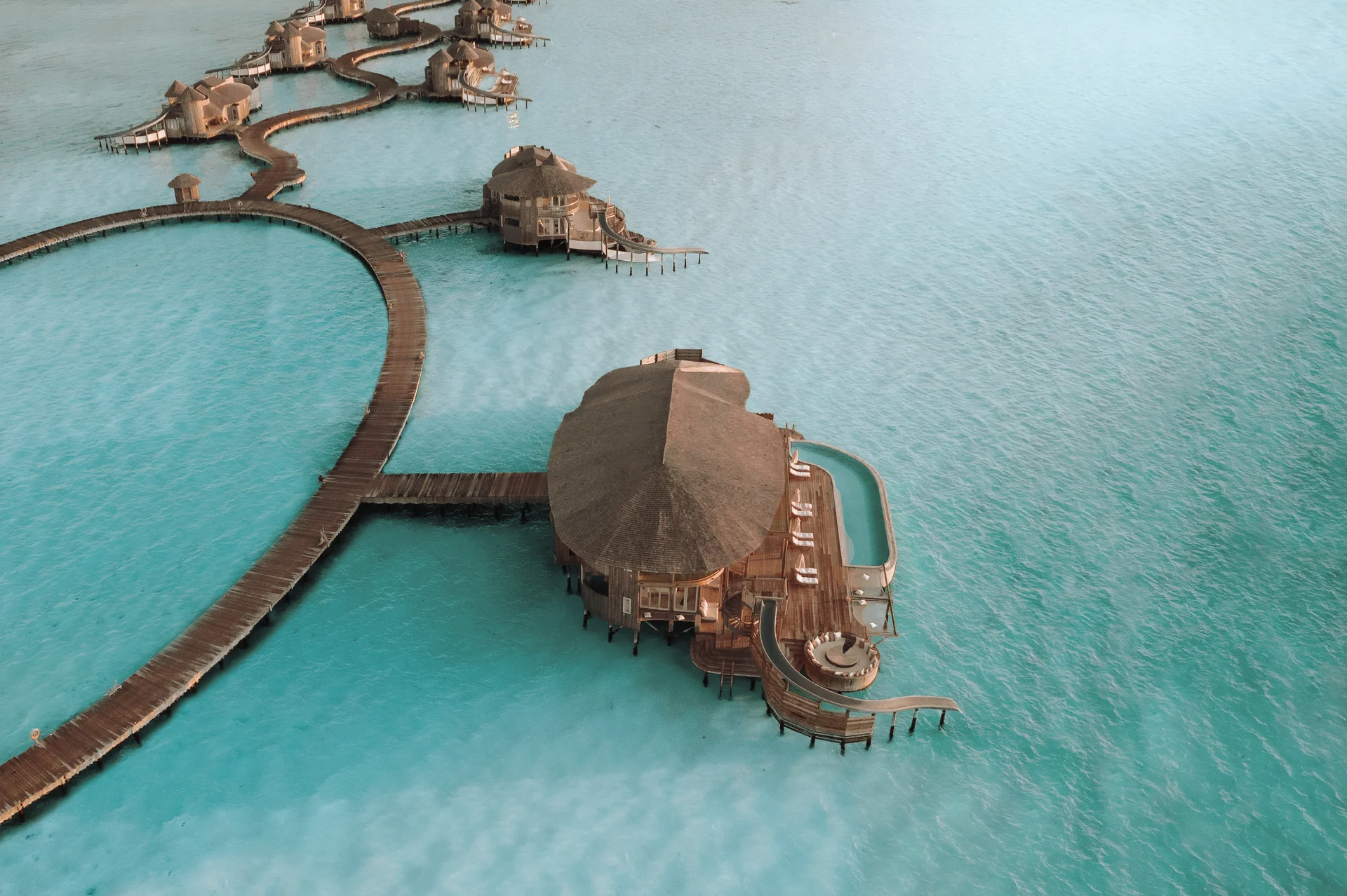 Overwater villas at sunset